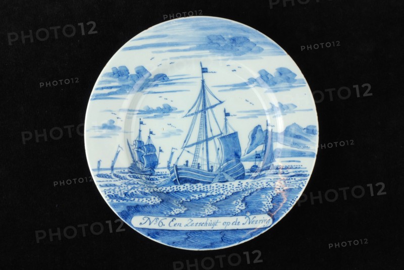 Manufacturer: De Porceleyne Bijl, Series of twelve plates with blue herring industry scenes: No 6. Zeeschuijt on the Neering