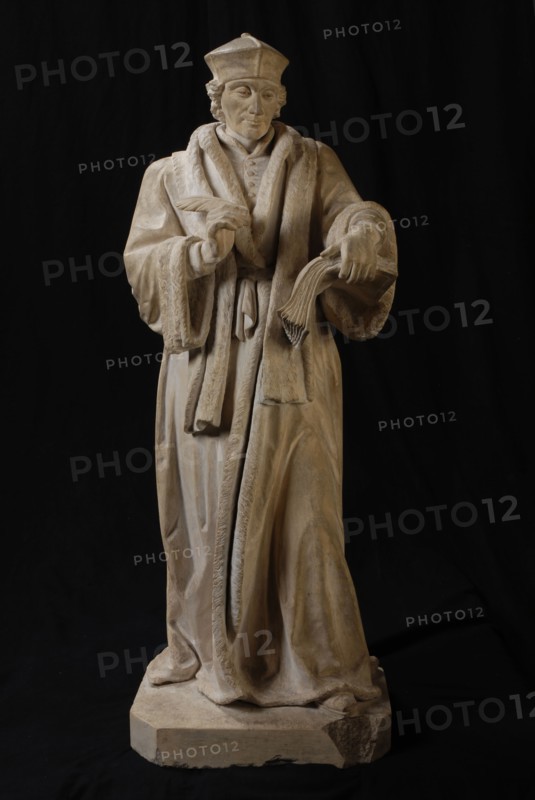 sculptor: Leo Paulus Johannes Stracké, Standing statue of Erasmus with book and quill pen in hand, sculpture sculpture sandstone