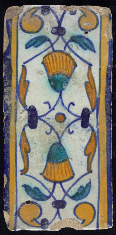Border tile, flower decoration in blue, yellow and green, upper and lower edge blue and yellow, border tile wall tile tile