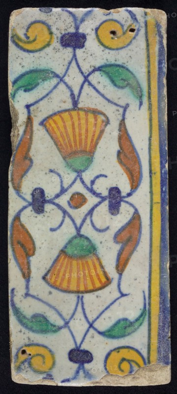 Border tile, flower decoration in blue, yellow and green, upper and lower edge blue and yellow, border tile wall tile tile