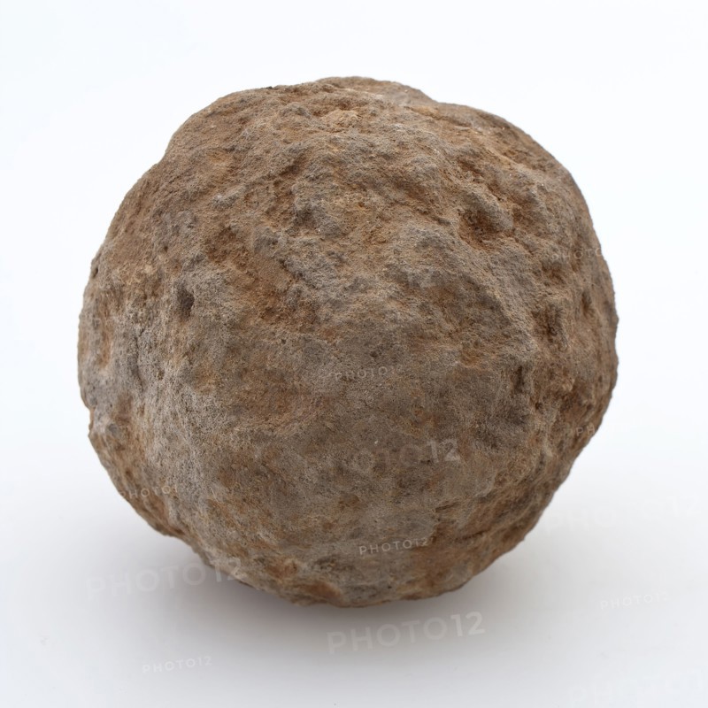 Small natural cannonball, irregular and stained, cannonball bullet projectile ammunition founding stone stone largest