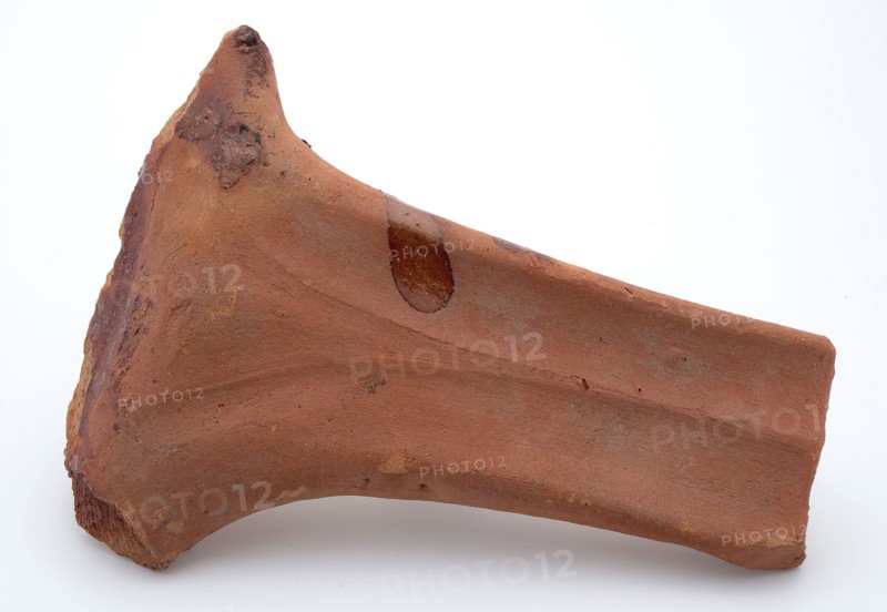 Fragment of red earthenware, partly with glaze, fragment crockery holder kitchen utensils earthenware ceramics earthenware glaze