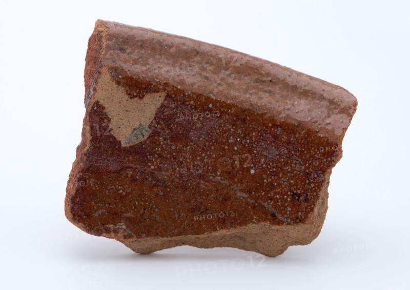 Fragment of red earthenware, partly glazed, fragment crockery holder kitchenware earth discovery ceramic earthenware glaze lead