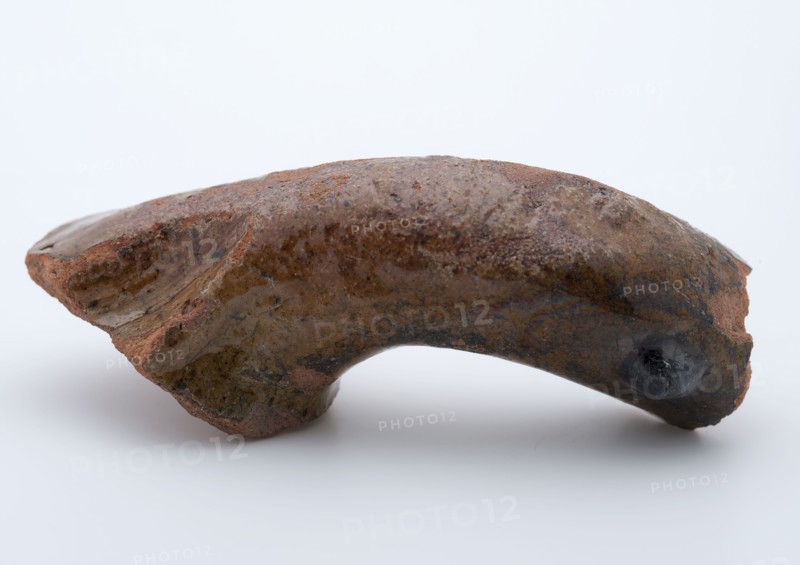 Fragment of red earthenware, partly glazed, fragment crockery holder kitchen utensils earthenware ceramics earthenware glaze