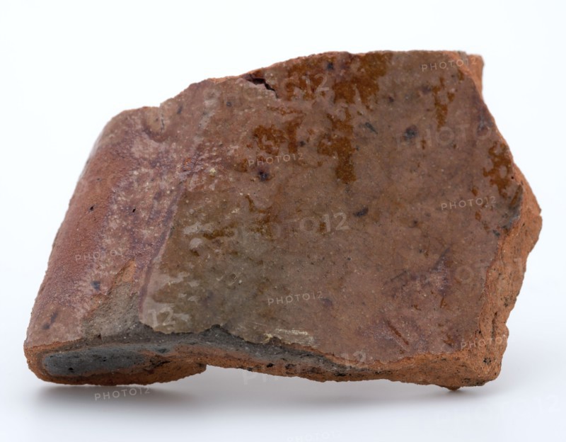 Fragment of red earthenware, partly glazed, fragment crockery holder kitchen utensils earthenware ceramics earthenware glaze