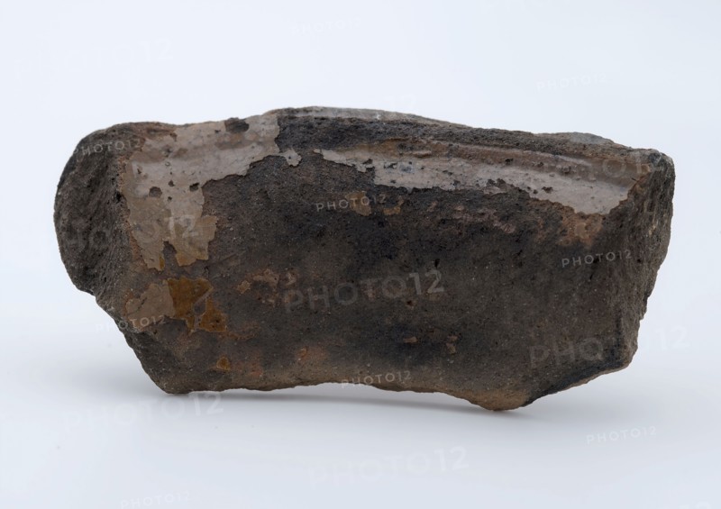 Fragment of red earthenware, partly glazed, fragment crockery holder kitchen utensils earthenware ceramics earthenware glaze