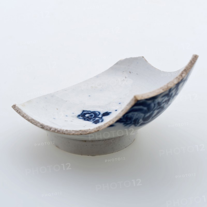 Bottom of small bowl with blue decor, industrial white goods, bowl of tea set soil find ceramic earthenware glaze lead glaze
