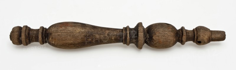 Twisted wooden bobbin, ornament artefact tools equipment soil finds wood, sawn turned wood Wooden spool or stick Fully decorated