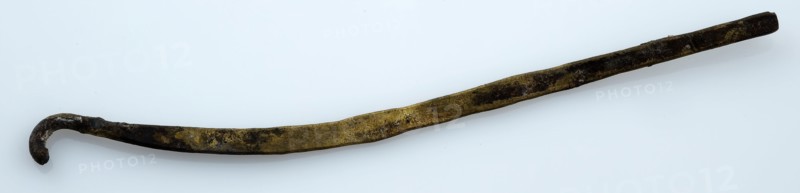 Strip brass, bent and provided with hook, artifact soil found brass copper metal, cast Strip brass Some curved shape at one end