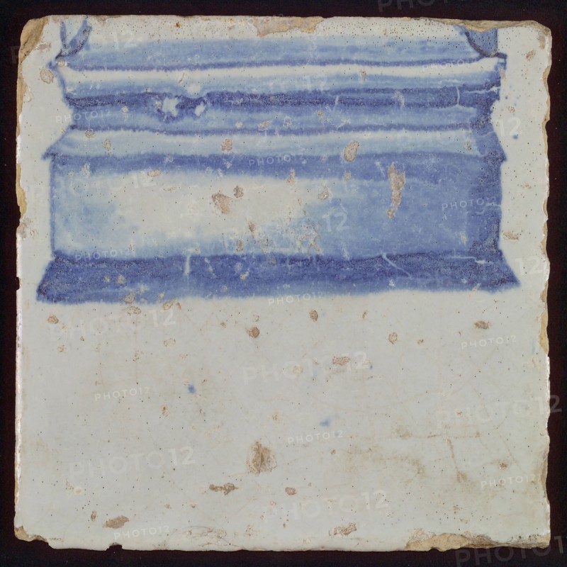 Loose tile from pilaster with part base in blue, chimney pilaster tile pilaster footage fragment ceramic pottery glaze tin glaze