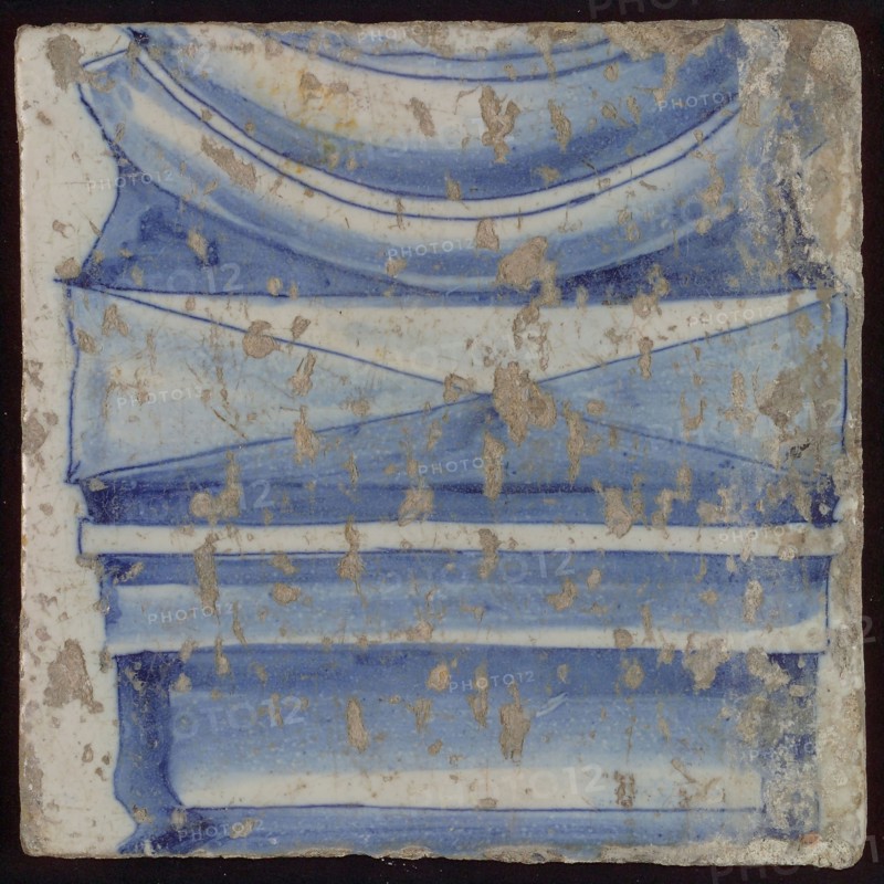 Loose tile from pilaster with decor in blue, part of pedestal, chimney pilaster tile pilaster footage fragment ceramic