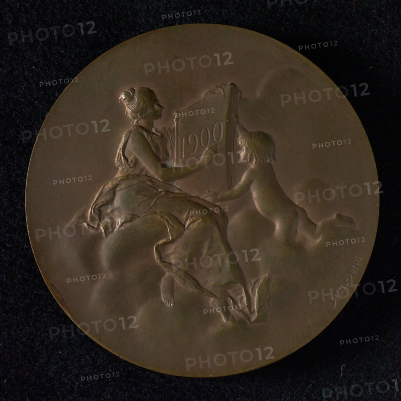 Daniel Dupuis (1849 - 1899), Medal of the Monnaie in Paris, penning footage bronze, winged genius torch in the right hand