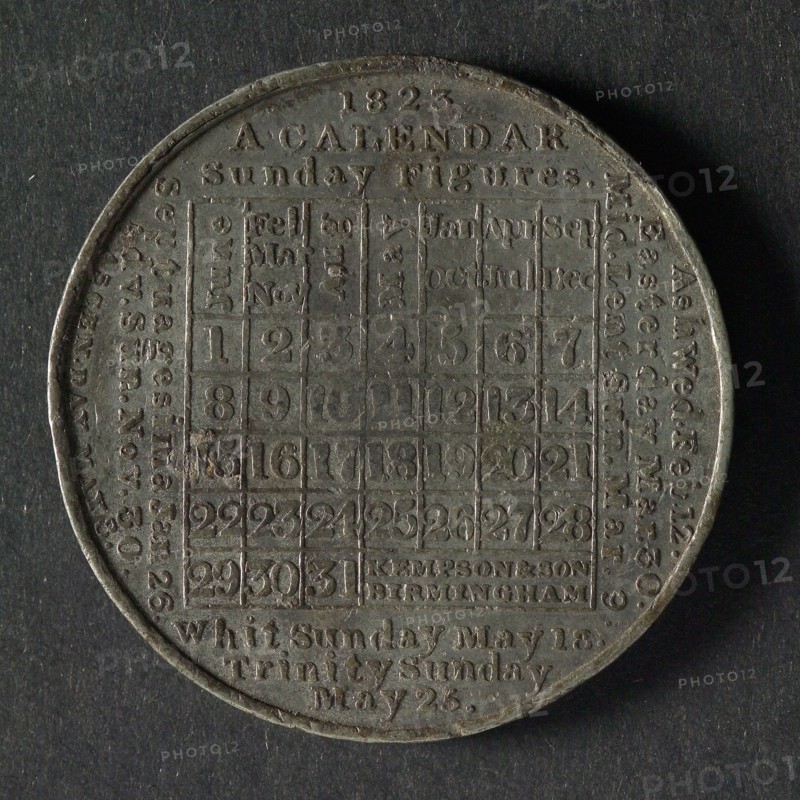 Calendar medal for the year 1823, calendar medal medallion image tin, text; underneath the calendar with links on the right