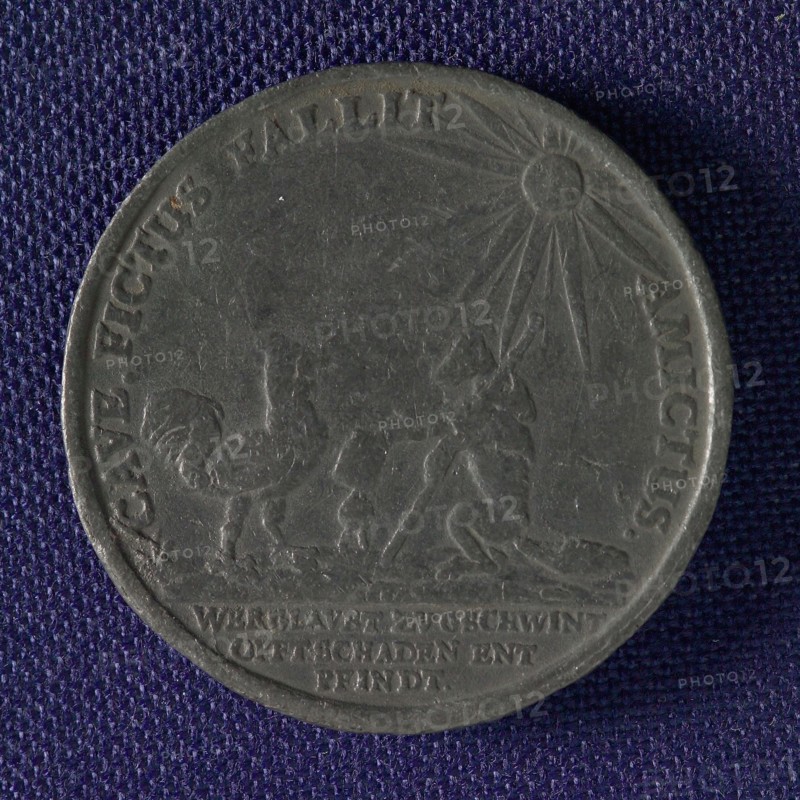 German penny on credulity, medallions lead metal, Fox shows rooster sealed certificate under bright sun legend: CAVE.FICTUS