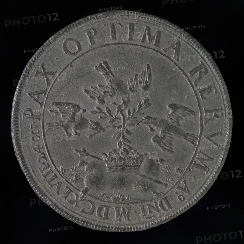 Engelbert Zettler, Medal on the Peace of Münster, medallion image metal lead, view of Münster; above it in wreath of olive