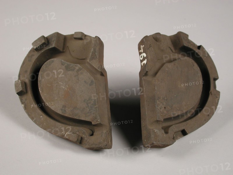 Two parts of three-piece bronze mold for ear of pot or jug, mold casting tool tools equipment base metal bronze, cast Three