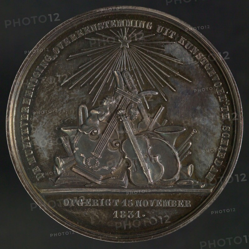 Medal on the occasion of the 25th anniversary of the Muziekgezelschap Ondereenstemming uit Kunstgevoel in Schiedam, penning