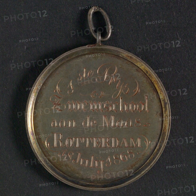 Price medal Zwemschool Rotterdam, price medal medal medal silver, Text, 1-th PRICE SWIM SOCCER AT THE MAAS ROTTERDAM 18 JULY