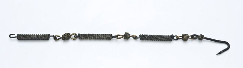 Copper casing closure, chain with cylindrical links and hook at end, chain closure clothing accessory clothing soil find brass