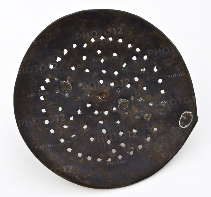 Skimmer with an iron handle, skimmer kitchenware soil find brass iron metal, archeology Rotterdam rail tunnel cake food prepare