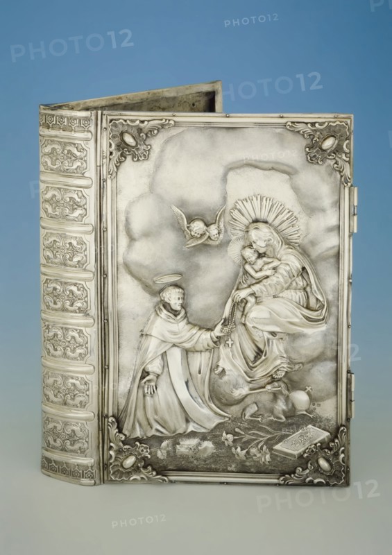 Silversmith: Jean George Grebe, Silver book cover with on the front the apparition of Mary to St. Dominic, cover