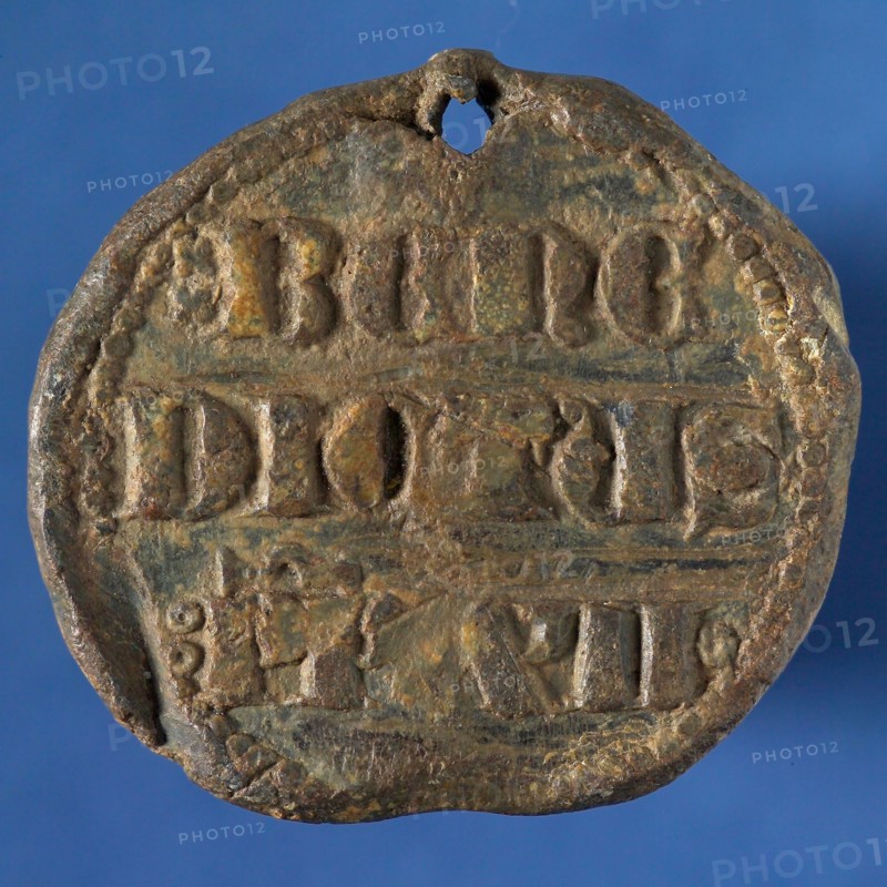 Bulla (lead papal seal), inscription Benedict PP XII, seal information form soil finding lead metal, facing portraits of Peter