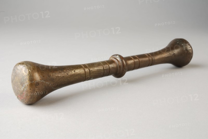 Bronze stamper, pestle tools equipment bronze, molded Pestle: round handle with profiled node in the middle.