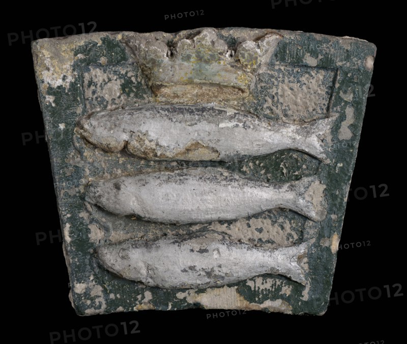 Facade stone with three crowned herrings, keystone building element facing stone sculpture stone, carved Cornerstone of gate