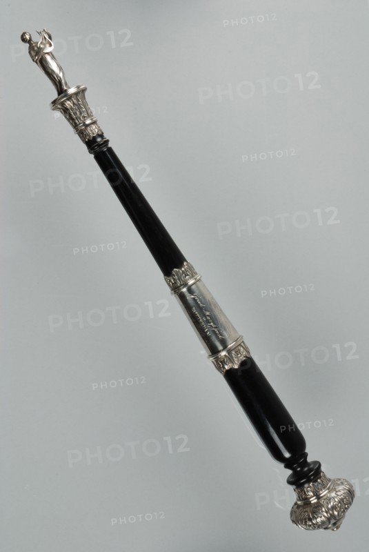 Silversmith: Jean George Grebe, Ebony dirigeer pole with silver fittings, topped with molded sculpture of lyre-bearing Muse