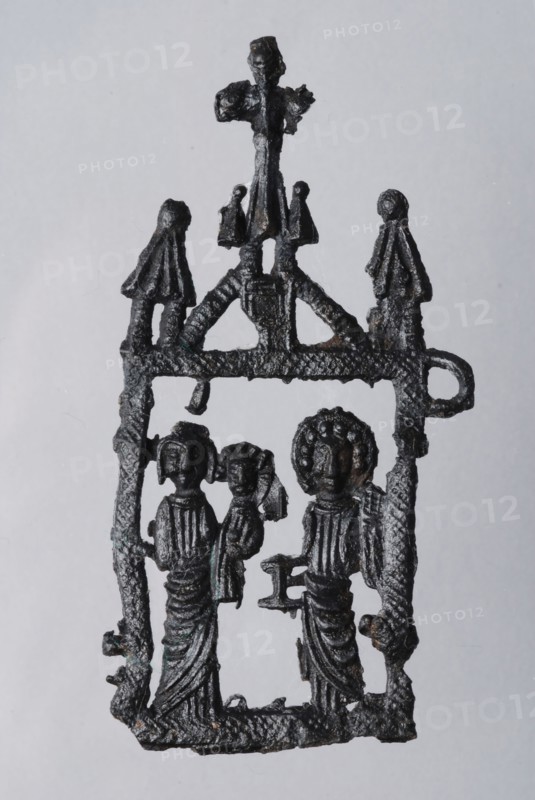 Pilgrim's badge, openwork maria with child, angel with candlestick, pilgrims insignia insignia devotionalia earth discovery tin