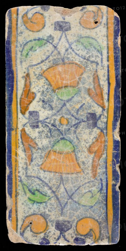 Border tile, flower decoration in blue, yellow and green, upper and lower edge blue and yellow, border tile wall tile tile