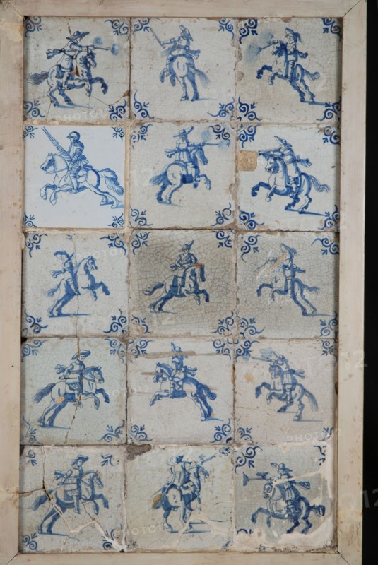 Tile field, fifteen tiles, blue on white, riders, corner motif of ox's head, tiled field wall tile tile sculpture ceramics