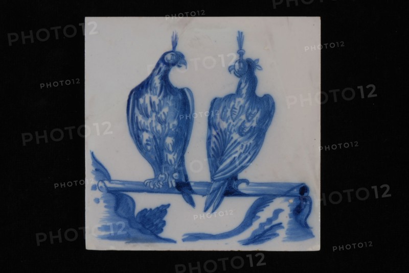 Jan Aalmis sr., Blue white tile with two falcons sitting on stick, wall tile tile sculpture ceramic earthenware glaze, baked 2x