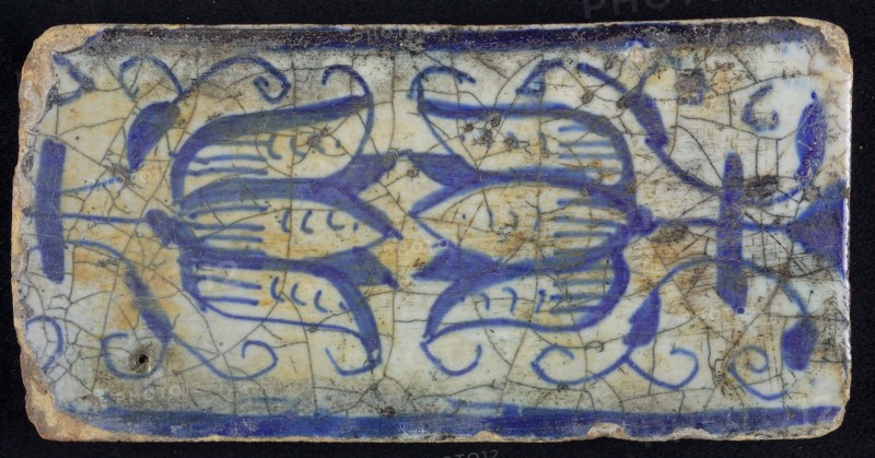 Blue border tile, waving floral pattern with tulips, above and below blue border, edge tile wall tile tile sculpture ceramic