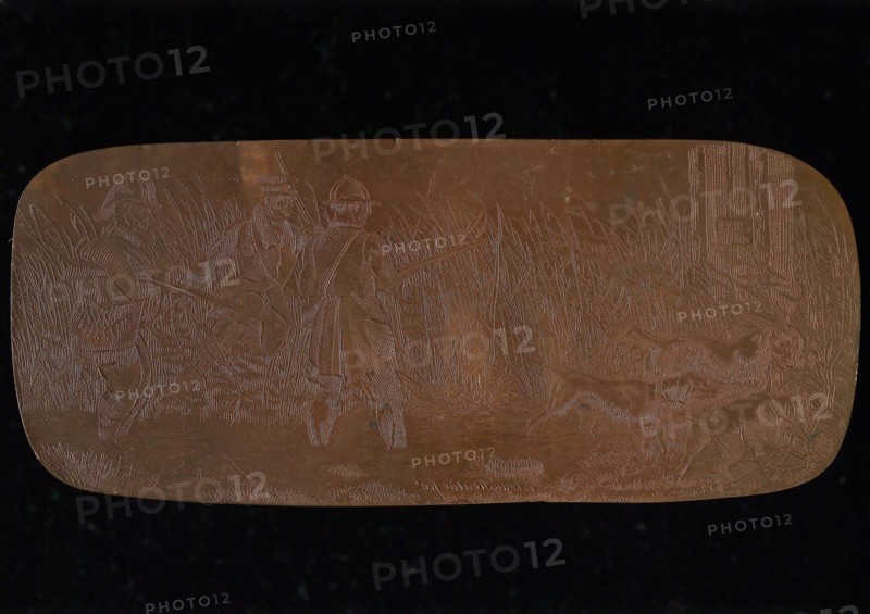 Copper cliché with hunters and dogs, cliché printer's equipment copper, engraved Red copper plate with three men