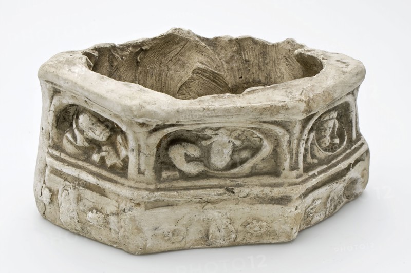 Pipes pedestal of statue of Madonna, sculpture footage earth discovery pottery earthenware pipe earth, in mold formed baked