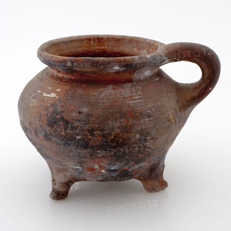 Pottery cooking jug, grape model, internally glazed, on three legs, cooking jug be found in the earthenware ceramic earthenware