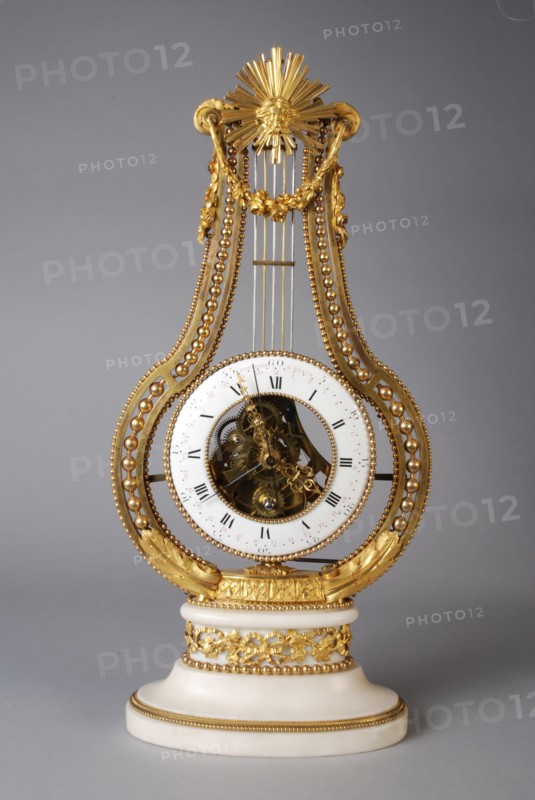 Jean-Simon Bourdier, died 1839, Clock in which the timepiece forms the weight of the pendulum, on an oval white marble base