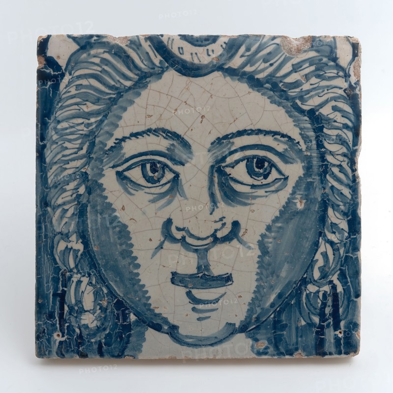 Tile of chimney pilaster, blue on white, head of woman with long curly hair, chimney pilaster tile pilaster footage fragment