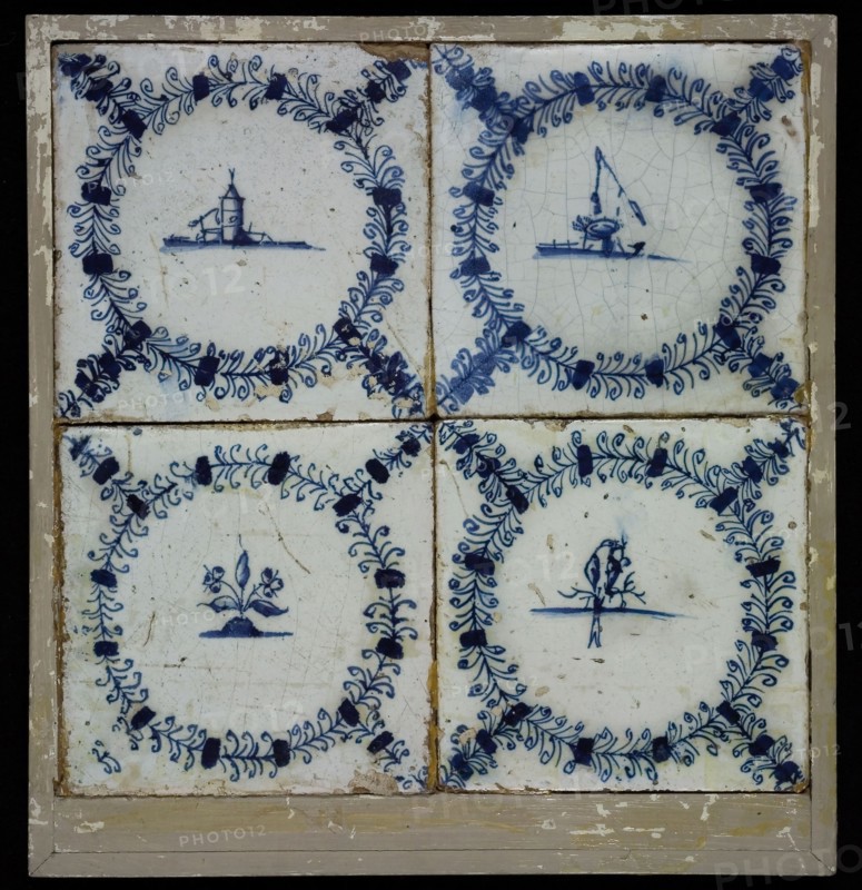 Tile field, four tiles, blue on white, diverse decor of tower and well, flower arrangement and bird on branch, all in egret