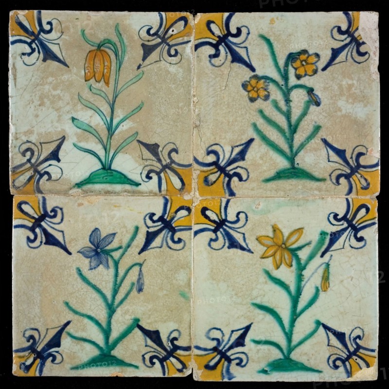 Tile field, four tiles with floral decor, flower on ground, yellow, green and blue on white, corner pattern lily, tiled field