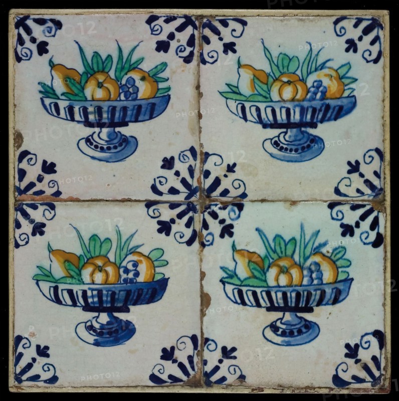 Tile field, four tiles, fruit decor, orange, yellow, green and blue on white, fruit bowl on foot, corner motif, tiled field wall