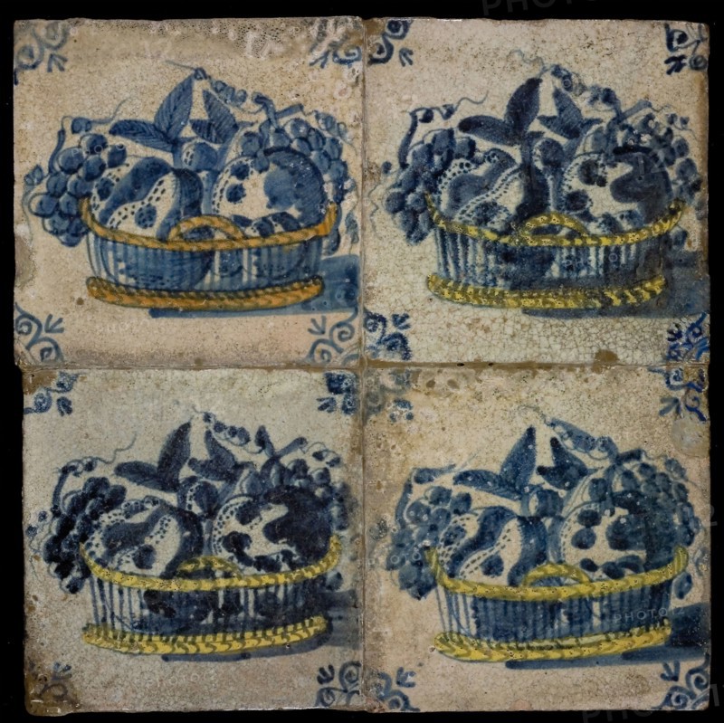 Tile field, four tiles, fruit decor, in blue and yellow on white, low filled fruit basket with yellow lower and upper edge