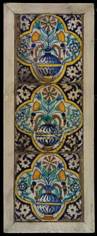 Tile field, three ornament tiles, yellow, orange, green and blue on white, flowerpot in quatrefoil, corner pattern palmet, tiled