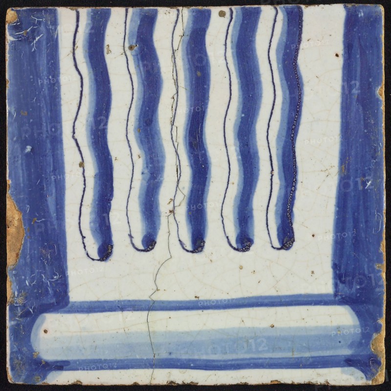 Tile of chimney pilaster, blue on white, part of pillar with undulating cannelure and basement, chimney pilaster tile pilaster