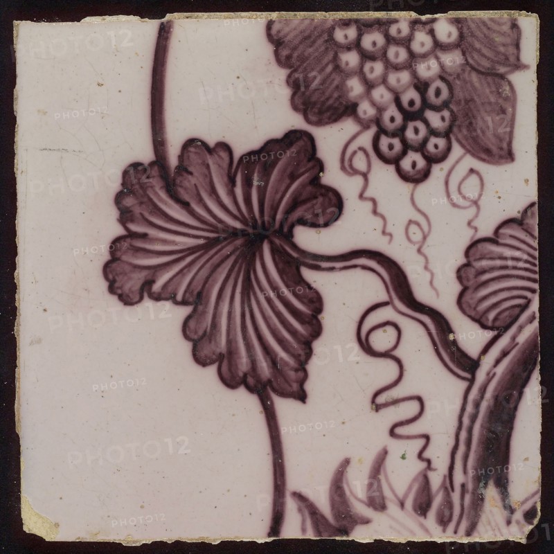 Tile of tile pilaster with twisted column with leaves of grapes, grapes, insects, spiders and bird, tile pilaster footage