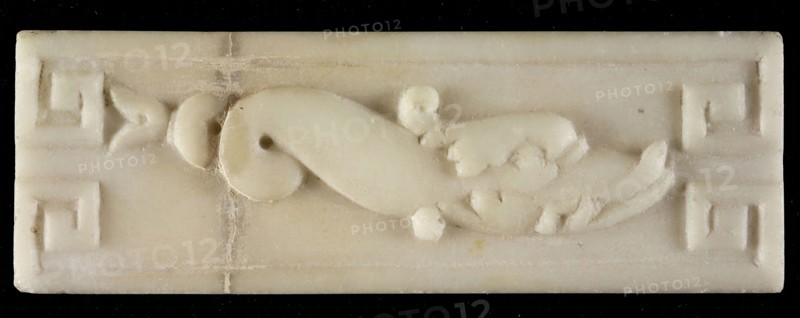 White marble relief, dolphin, with two curls in tail, meander-ornament in corners, relief marble stone, Rotterdam City Triangle
