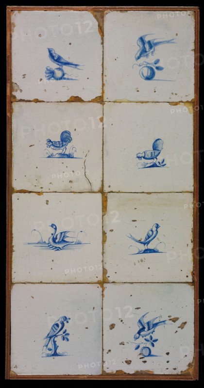Tile field, eight tiles, blue on white, birds, including two cocks on the ground, tiled field wall tile sculpture ceramics