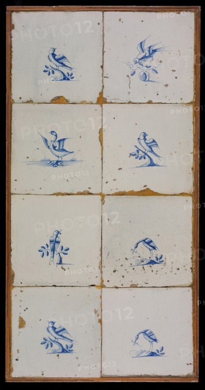 Tile field, eight tiles, blue on white, birds, among others two storks or herons, tiled field wall tile sculpture ceramic