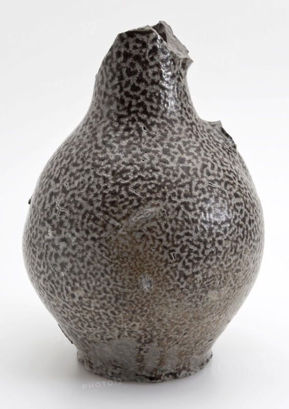 Stoneware jug, gray and brown speckled glazed, convex model on stand, jug soil find ceramic stoneware glaze salt glaze, surface